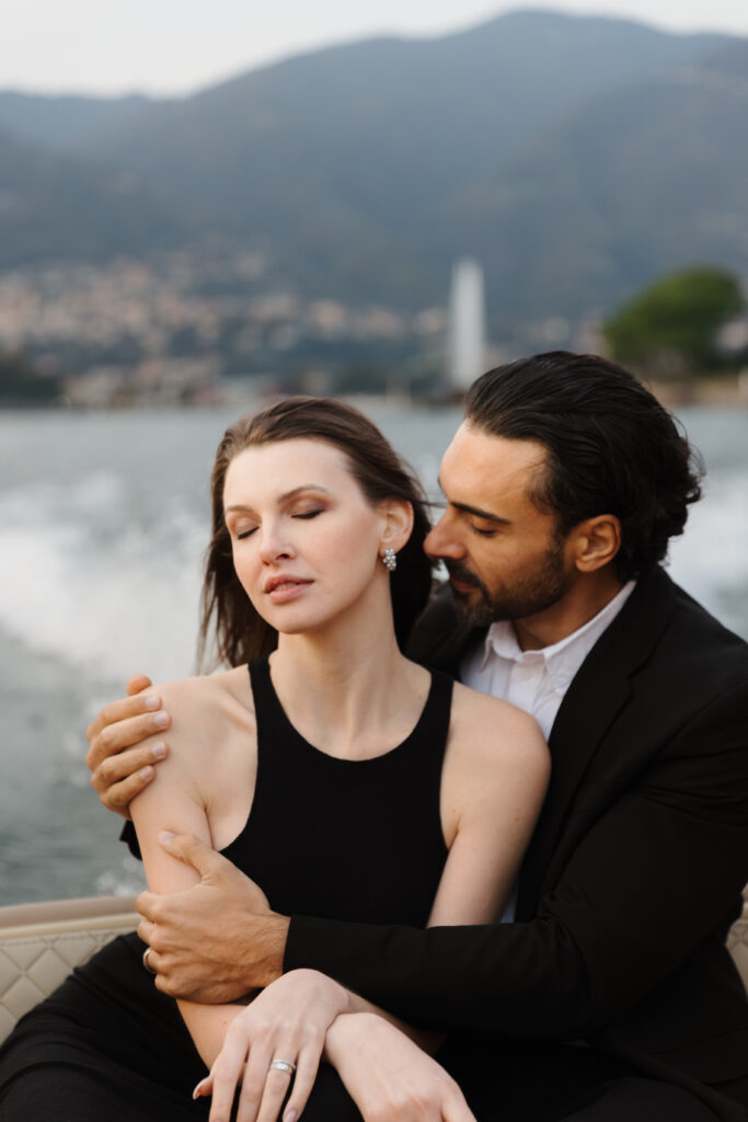 A couple in a romantic boat ride on Lake Como, Italy